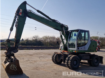 Excavadora de ruedas NEW HOLLAND MH CITY