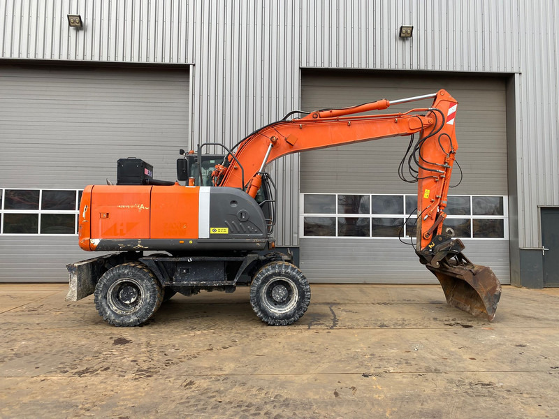 Excavadora de ruedas Hitachi ZX140W-3: foto 6